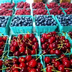 Cherries, Blueberries, Raspberries in green cartons