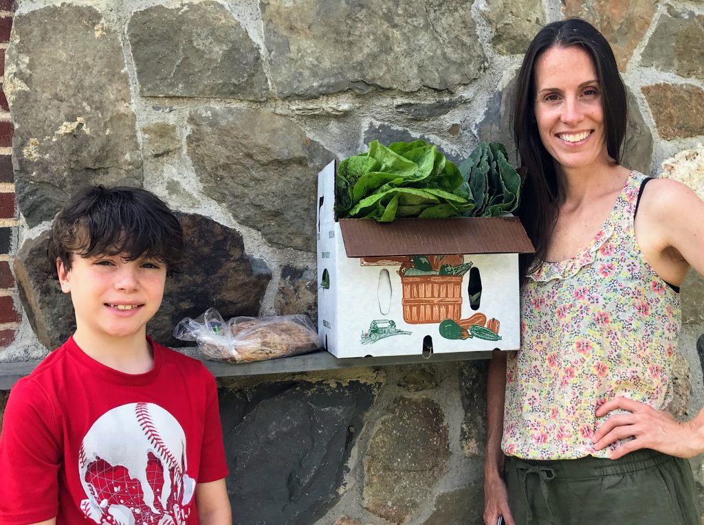 boy and mom with veggie box