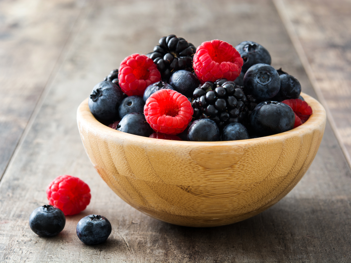 raspberries and blackberries in a bowl